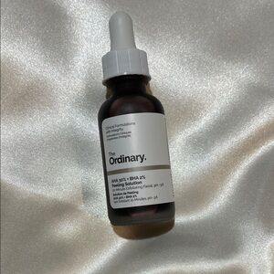 The Ordinary Peeling Solution Bottle in White and Brown